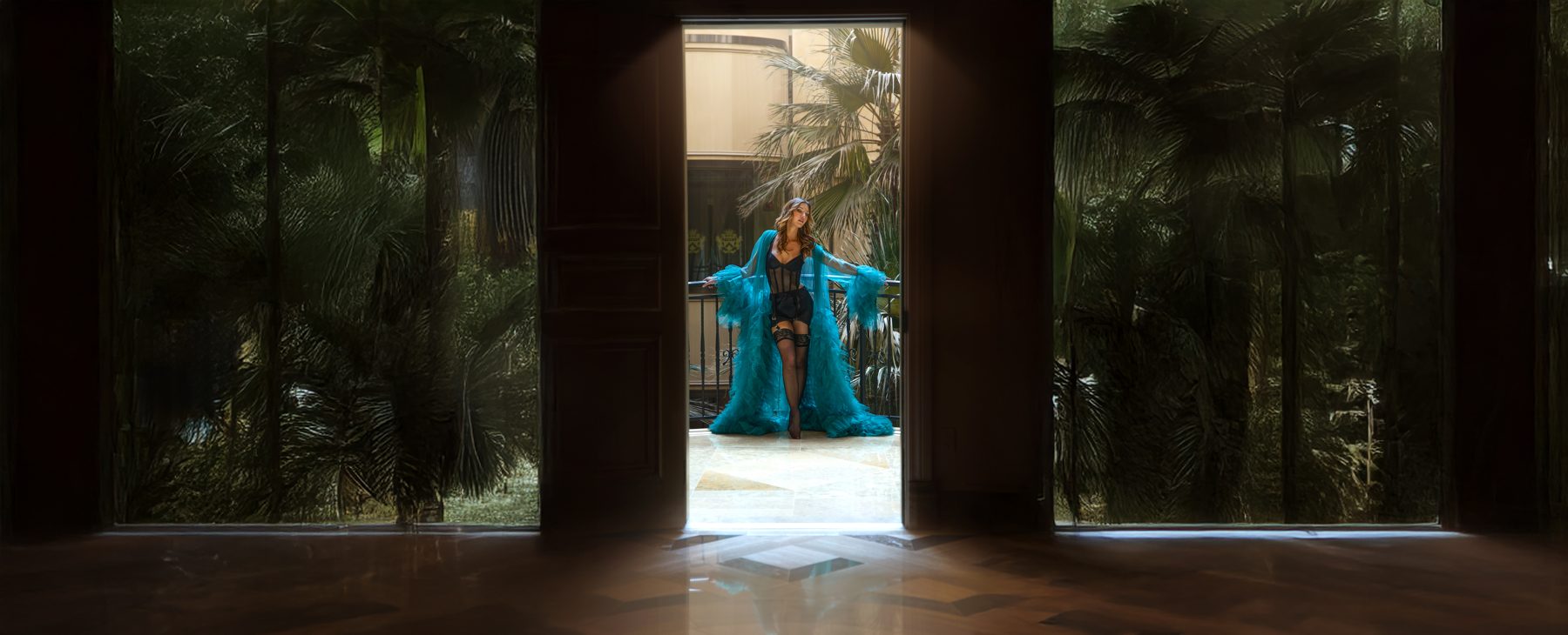 Woman in a doorway, destination boudoir portrait
