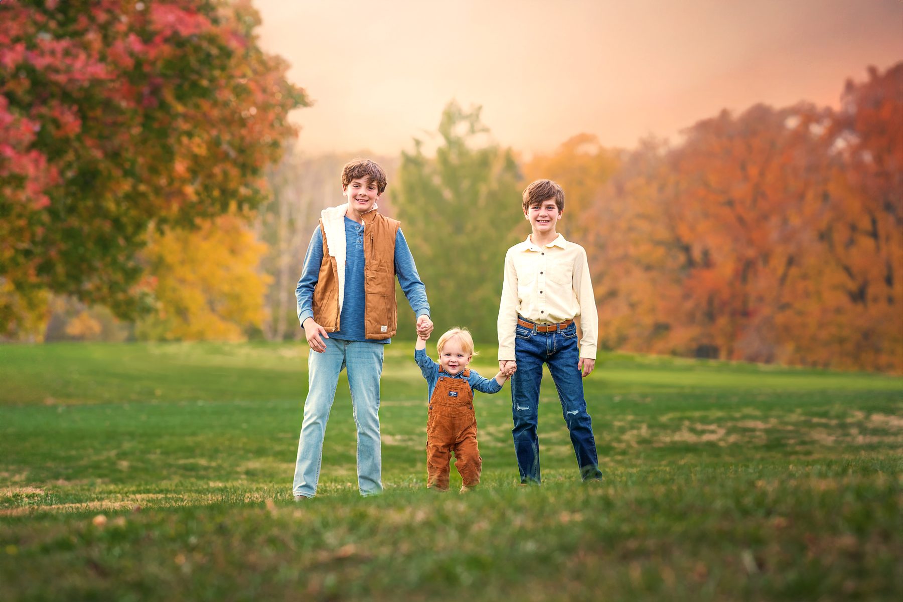 Family walking through a fall field, Northern Virginia